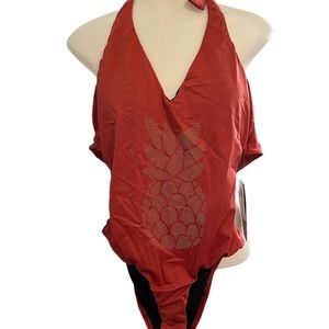 Reef brand pineapple swimsuit brand new with tags . Size medium.